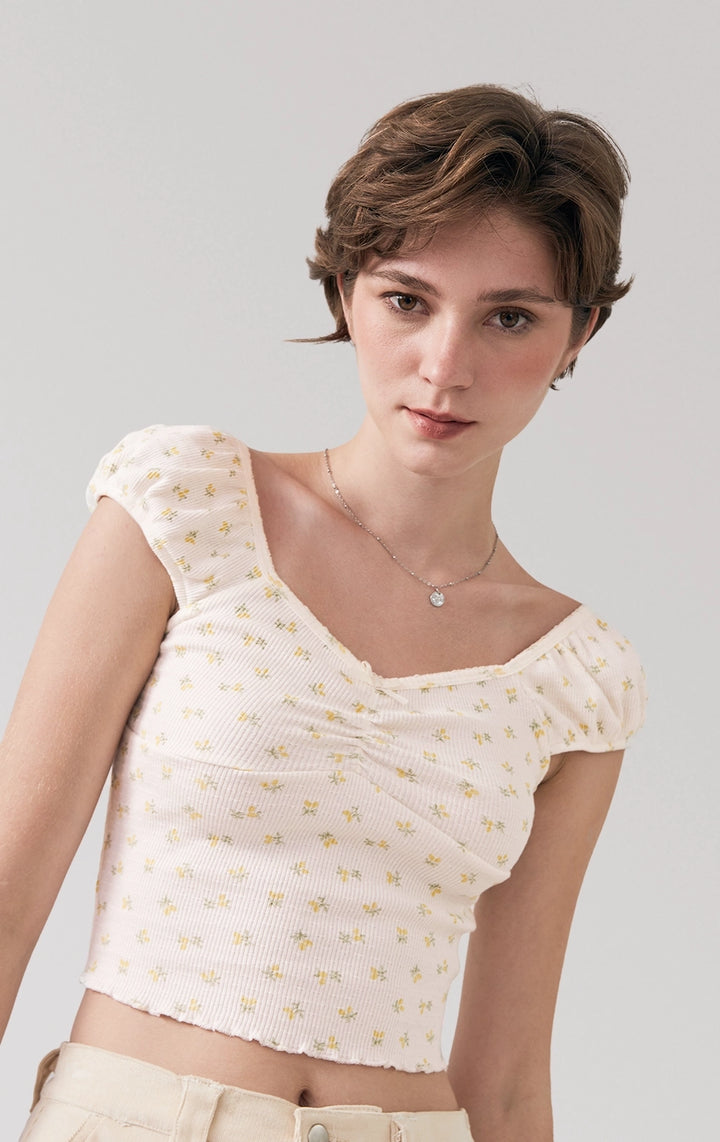 Stylized photo of model in the Printed Textured Ribbed Jersey Corset-Like Top with Picoting and Bow, styled for hangouts from Just G Philippines’ Back to School collection.