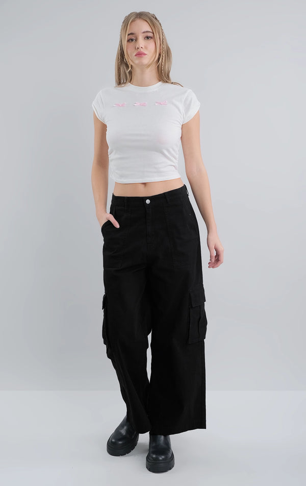 BOW APPLIQUE TEE WITH SIDE RUCHING AND FOLDED SLEEVE DETAIL