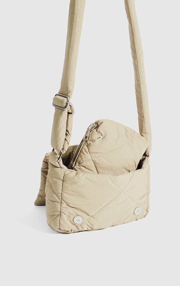 Close-up of the puffer texture and pouch on the Khaki 2-in-1 Sling with Pouch Puffer Bag