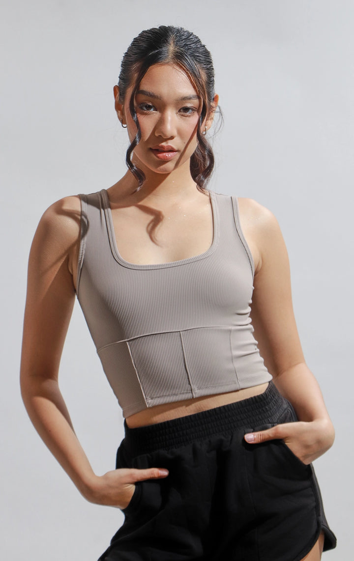 Stylized photo of brown Ribbed Corsetry-Like Square Neck Tank Top from Just G Philippines’ athleisure collection—designed for girls with an active lifestyle.