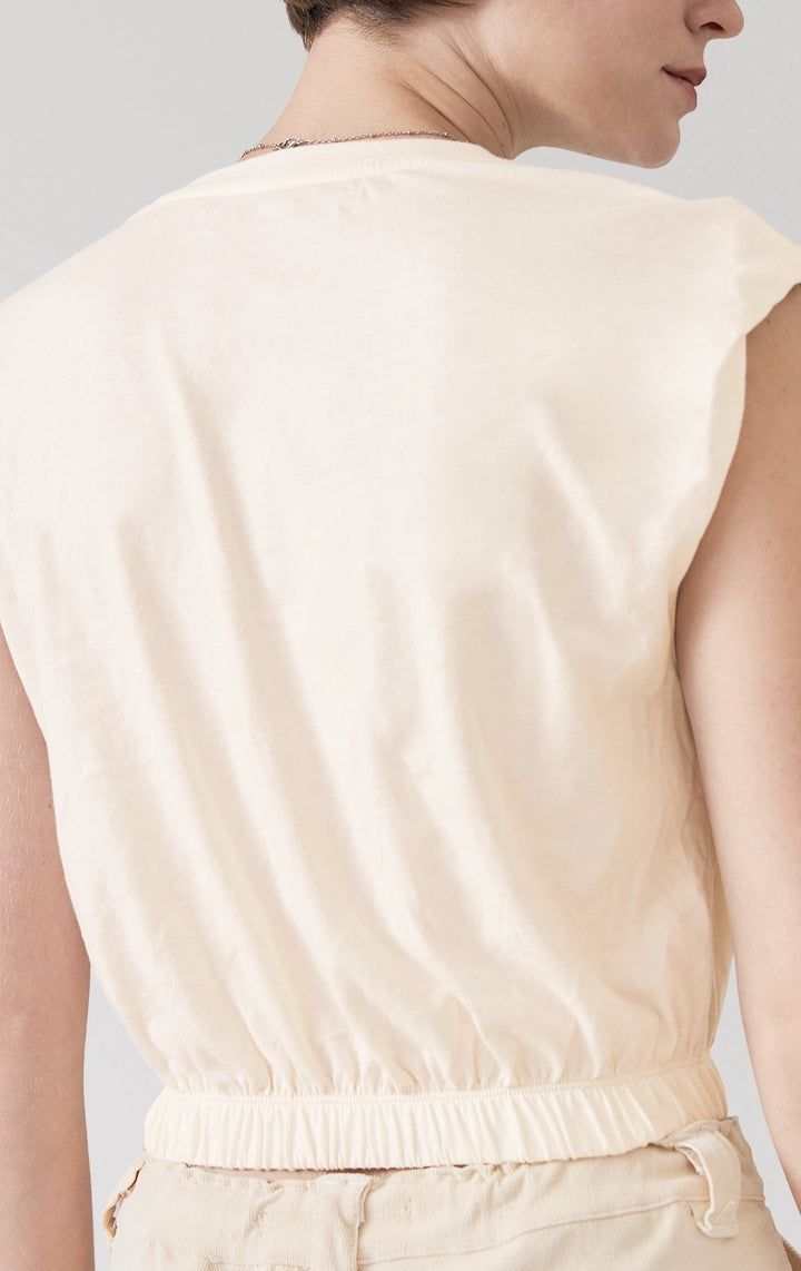 Close-up of back details of the Single Jersey Cropped Muscle Tee in offwhite, capturing soft jersey knit texture and hem finish from Just G Philippines.