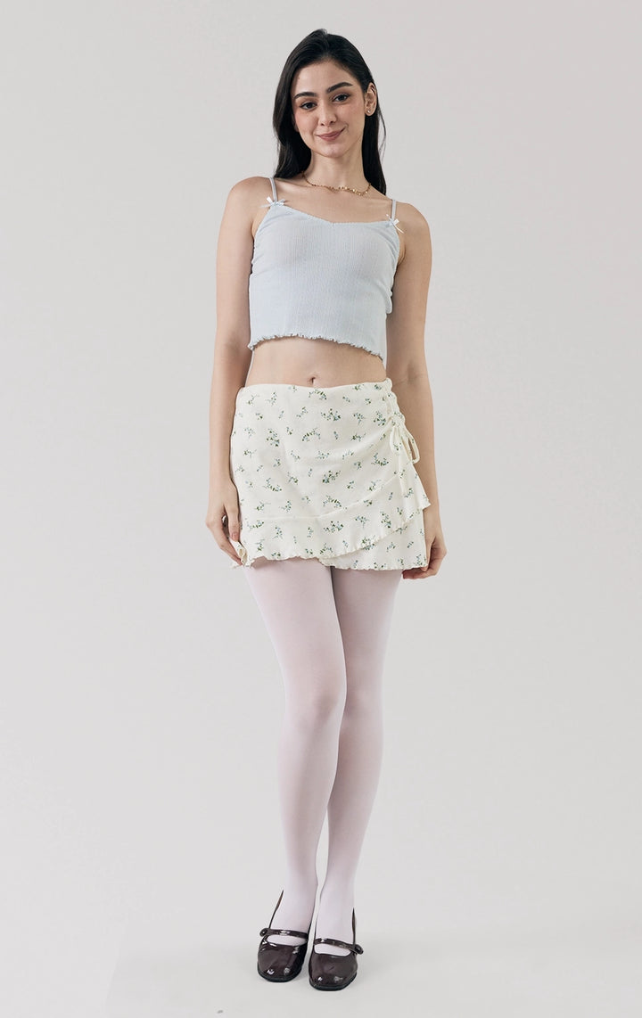 Full front view of the Pointelle Ribbed Jersey Tank Top in blue, highlighting its lace trim, dainty bow accents, and cropped fit from Just G Philippines.