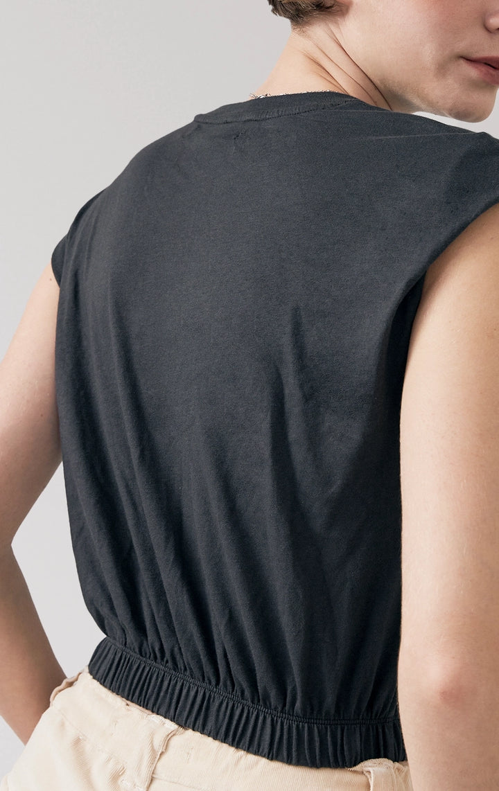 Close-up of back details of the Single Jersey Cropped Muscle Tee in black, showcasing smooth jersey texture and elastic hem from Just G Philippines.