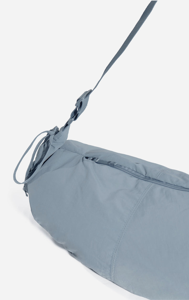 Close-up of the drawstring and pleats on the Blue Dumpling Shoulder Bag
