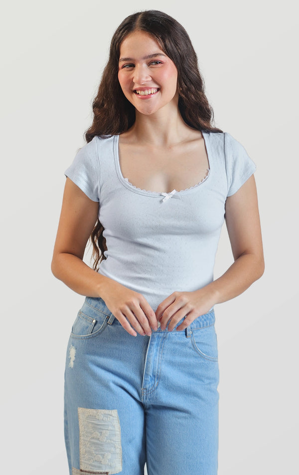 POINTELLE JERSEY BABY TEE WITH LACE AND BOW DETAILS