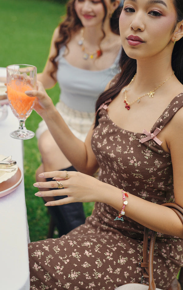 DITSY FLORAL PRINT POINTELLE JERSEY CORSET-LIKE TANK TOP WITH CONTRAST SATIN BOWS