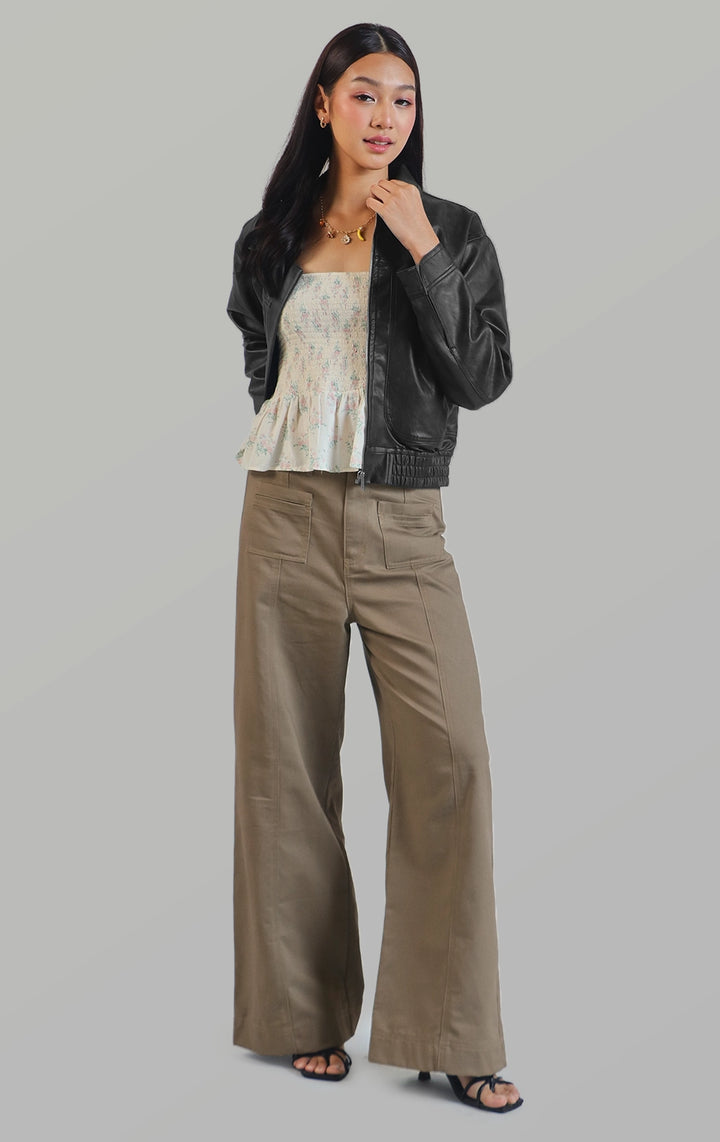 Full front view of the nylon/leather boyfriend jacket for women showing its collared neckline, long sleeves, and full-length design by Just G Philippines