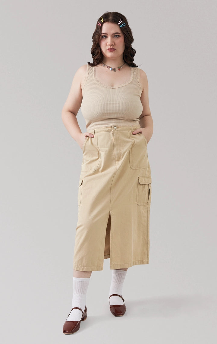 Full front view of a model wearing the off-white ribbed tank top with lace and bow detail that has a sweetheart neckline by Just G Philippines 