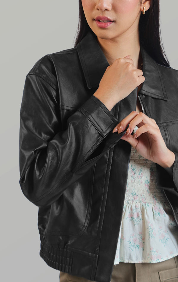 Full front view of the nylon/leather boyfriend jacket for women showing its collared neckline, long sleeves, and full-length design by Just G Philippines