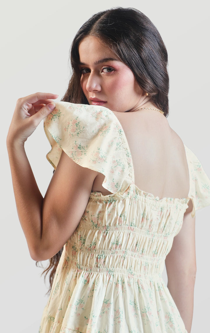 Back detail close-up of the smocked bodice and ruffle sleeve edges by Just G Philippines