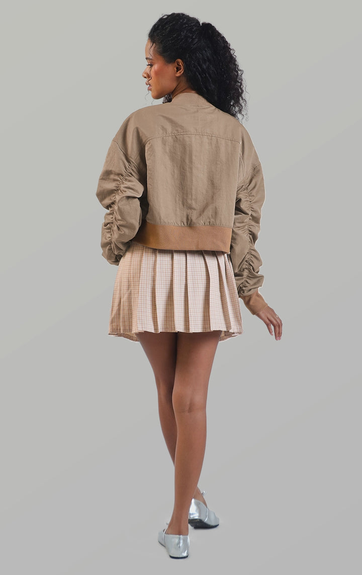 Full back view of the polynylon cropped bomber jacket with ruching detail showing the cropped hem and relaxed fit for women by Just G Philippines