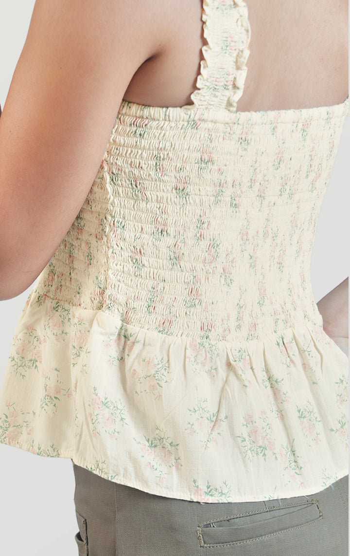 Back close-up of the floral smocked peplum top showing the smocked fabric texture and stitching by Just G Philippines
