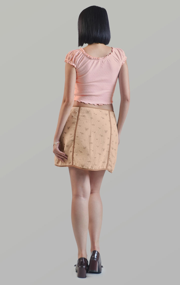 Full back view of the pointelle jersey ruffled milkmaid puff sleeve top highlighting the back fit and gathered detail by Just G Philippines