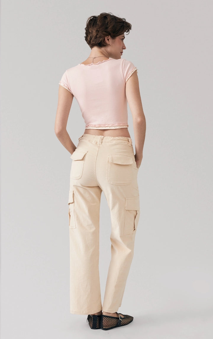 Full back view of the lettuce edge tee in pink showing ribbed jersey texture and cropped hem by Just G Philippines