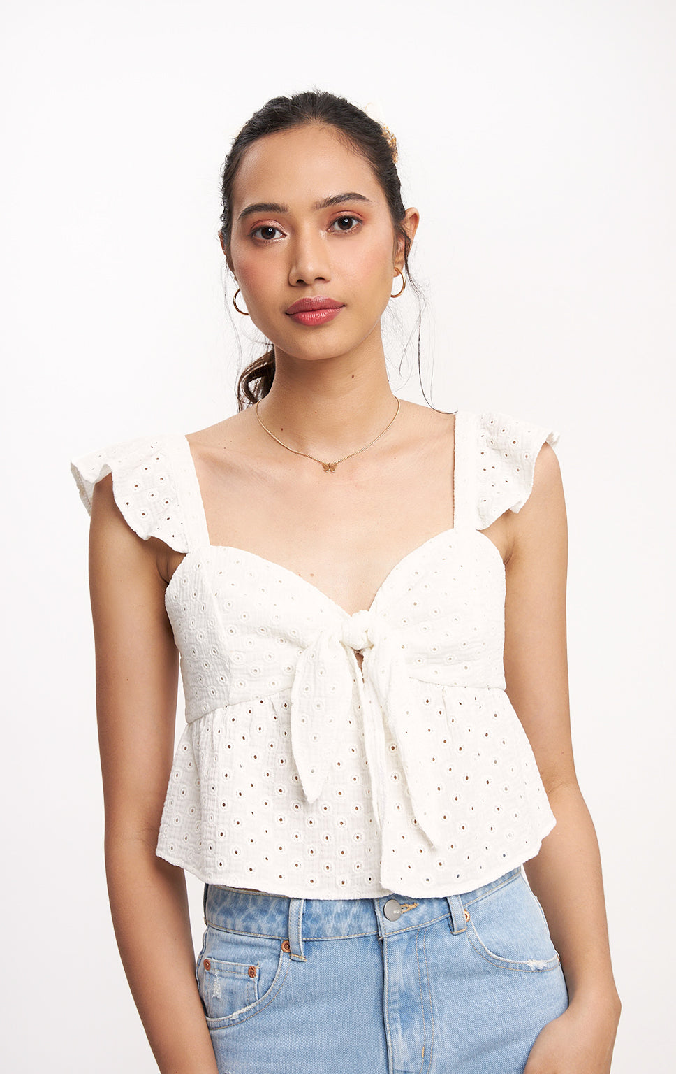 ROMANTIC EYELET KNOTTED TOP WITH RUFFLES