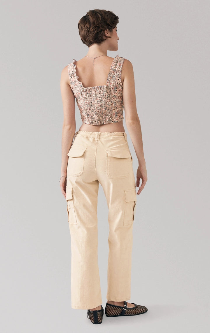 Full back view of the floral ruffled top showing crumpled viscose texture and cropped cut by Just G Philippines