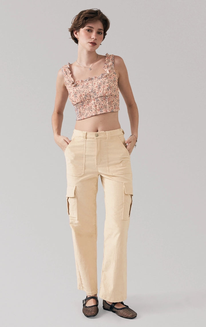 Full front view of a model wearing the floral ruffled crop top with square neckline by Just G Philippines