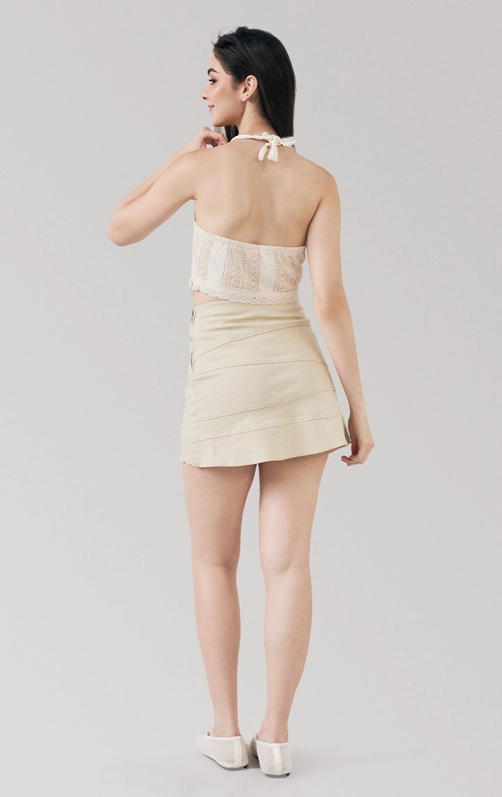 Full back view of the offwhite Crochet-Like Halter Top with Handkerchief Hem, featuring open back and cropped fit, from Just G Philippines’ Back to School collection.