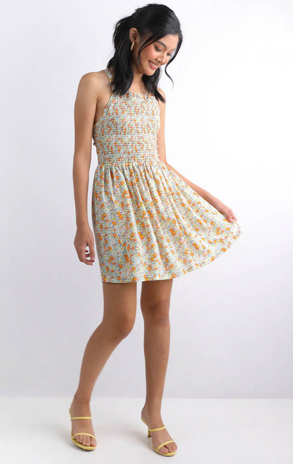 FLORAL SMOCKED CRISS CROSS BACK DRESS