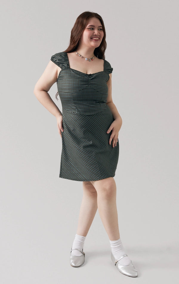 Full front view of a model wearing the multicolor mini dress with sweetheart neckline and puff sleeves by Just G Philippines