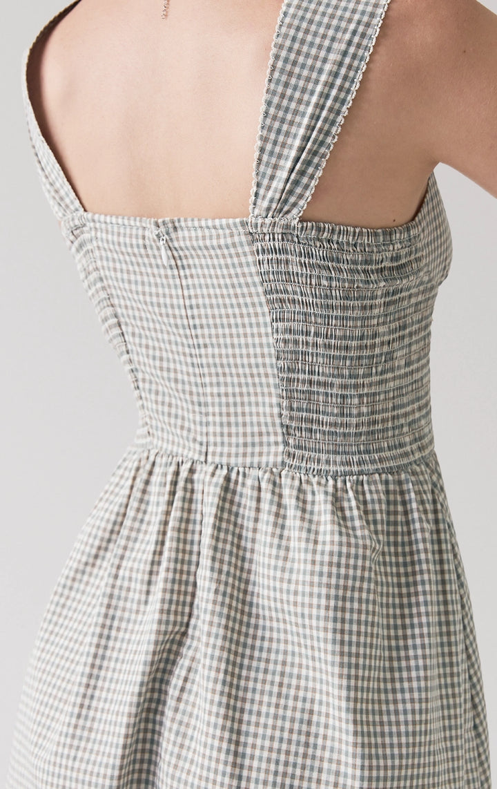 Close-up of back details of Checkered Corset-Like Dress, featuring smocked fit and clean stitching. From Just G Philippines.