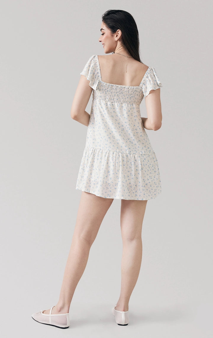 Full back view of Floral Print Tiered Short Dress, showing relaxed silhouette and tiered mini-length hem. From Just G Philippines.