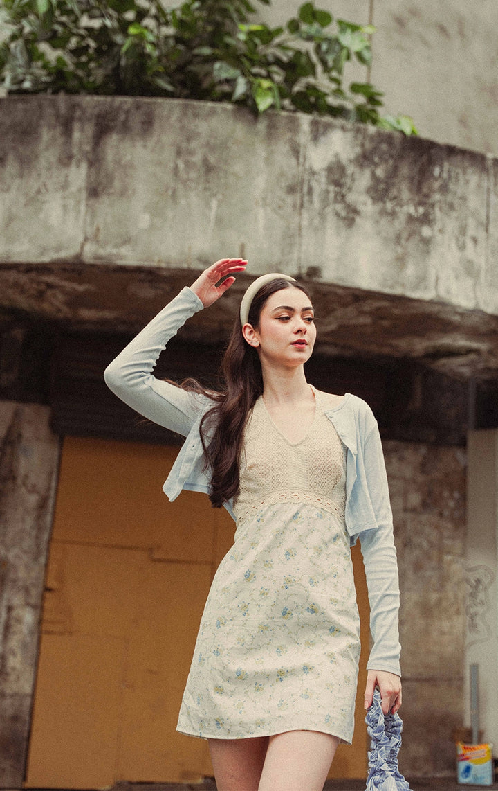 Campaign photo of girl wearing Combi Crochet-Like And Vintage Floral Print Poplin Halter Short Dress from the back to school line of Gen Z fashion brand Just G Philippines.