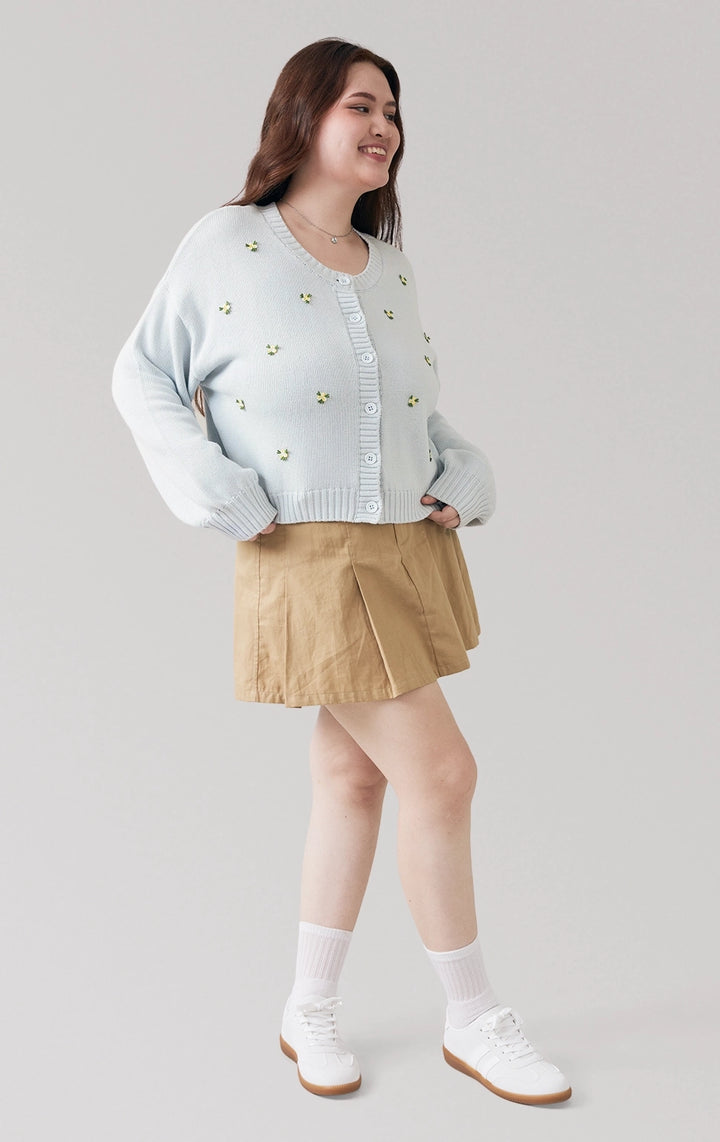 Full front view of model in blue Chunky Knit Cardigan With Flower Bullion Embroidery, showing its relaxed fit and soft texture from the Back to School line by Just G Philippines.
