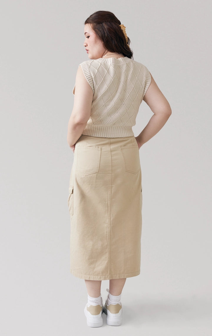 Full back view of the Trellis Cable Knit Button Front Cropped Vest in beige, highlighting its clean silhouette and textured knit from Just G Philippines.