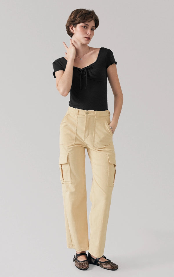 Full front view of a model wearing the pull-on cargo pants for women made by corduroy fabric by Just G Philippines