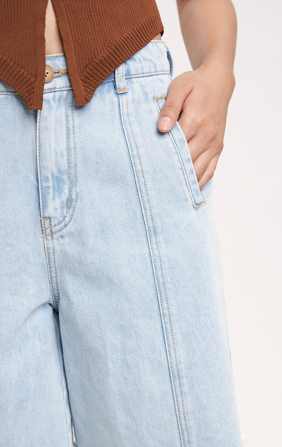 HIGH WAISTED DENIM JORTS WITH CUT AND SEW DETAIL