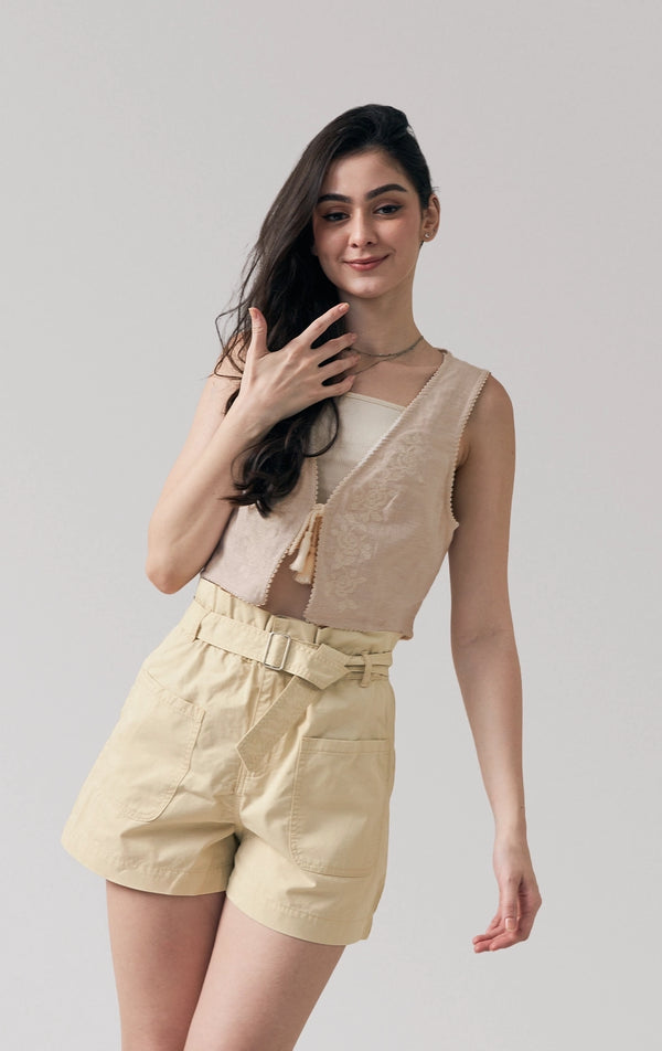Full front view of a model wearing the linen-like highwaist paperbag shorts with belt by Just G Philippines