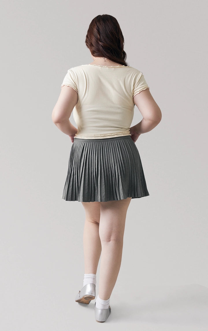 Full back view of the pleated skirt with smooth poly-nylon fabric and fitted waistband by Just G Philippines