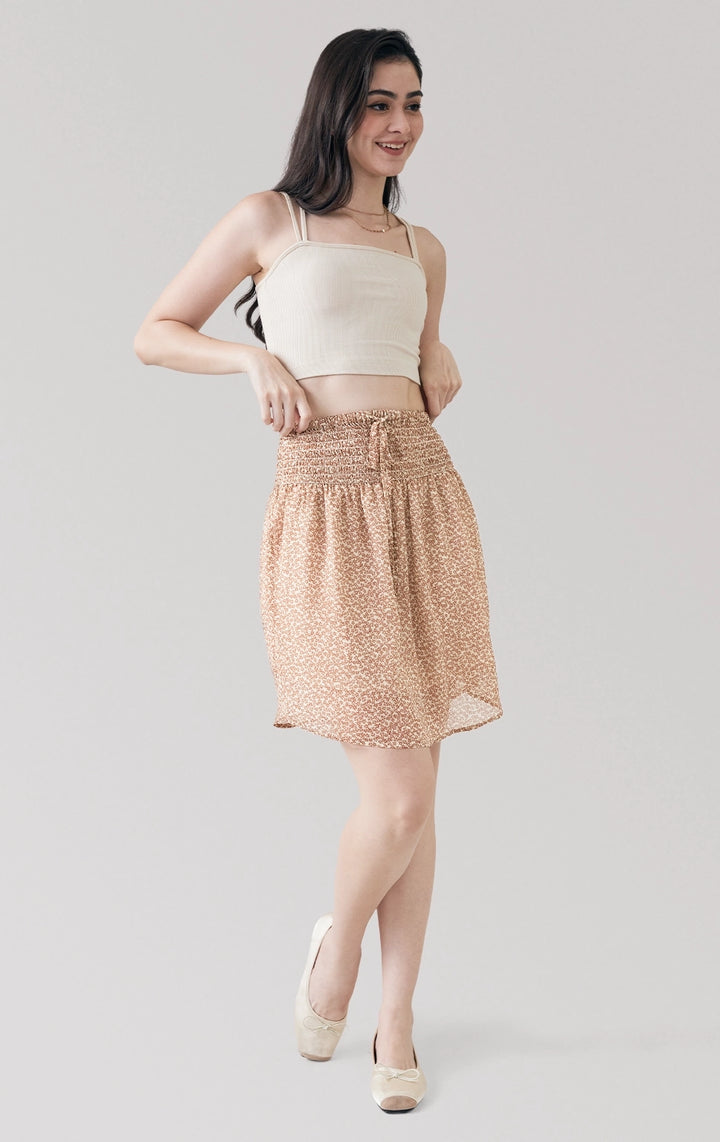Full front view of model in High-Waist Drawstring Smocked Waist Chiffon Long Skirt, showing off its floaty crepe chiffon fabric from Just G Philippines.