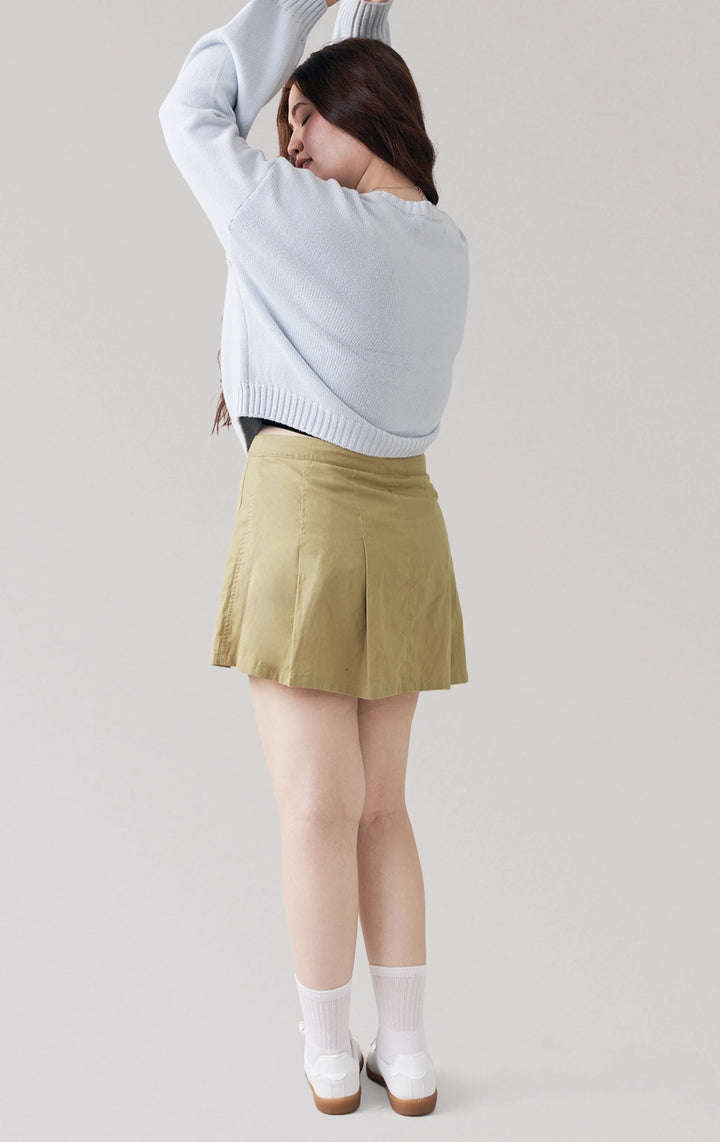 Full back view of the Belted Pleated Mid Waist Skort in green, highlighting the crisp silhouette and back panel flow from Just G Philippines.