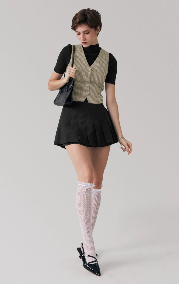 Full front view of a model wearing the houndstooth vest with button-up design and v-neckline by Just G Philippines